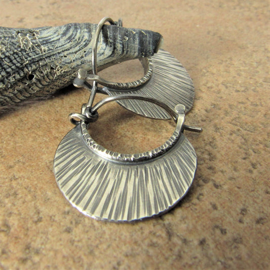 Small textured SS hoops by Mocahete photo on beige background with shell.