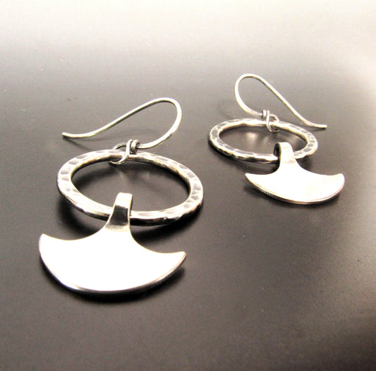Hammered Argentium silver hoop earrings with oxidized finish and dangling axe blade charms, inspired by goddess Durga.