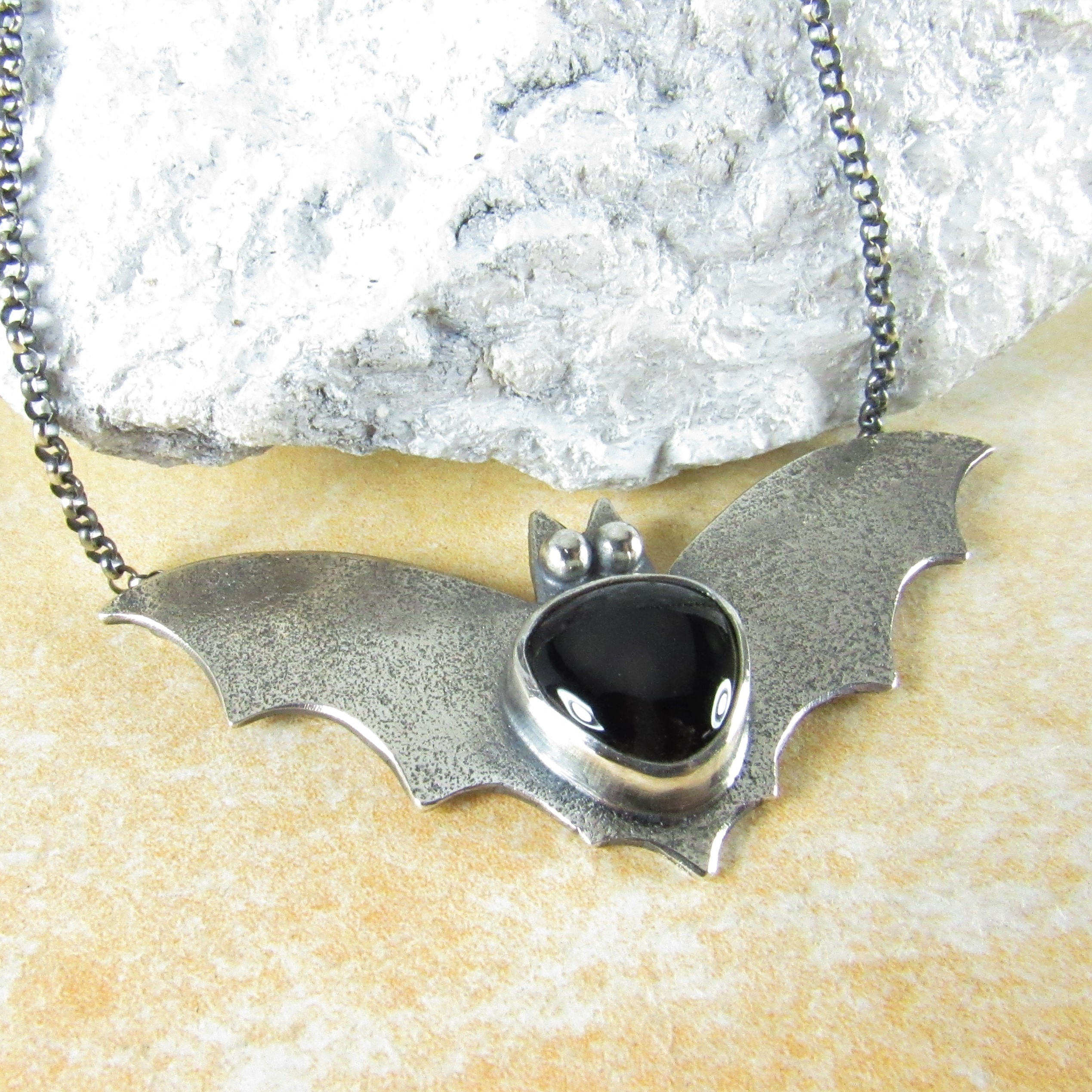 silver bat pendant