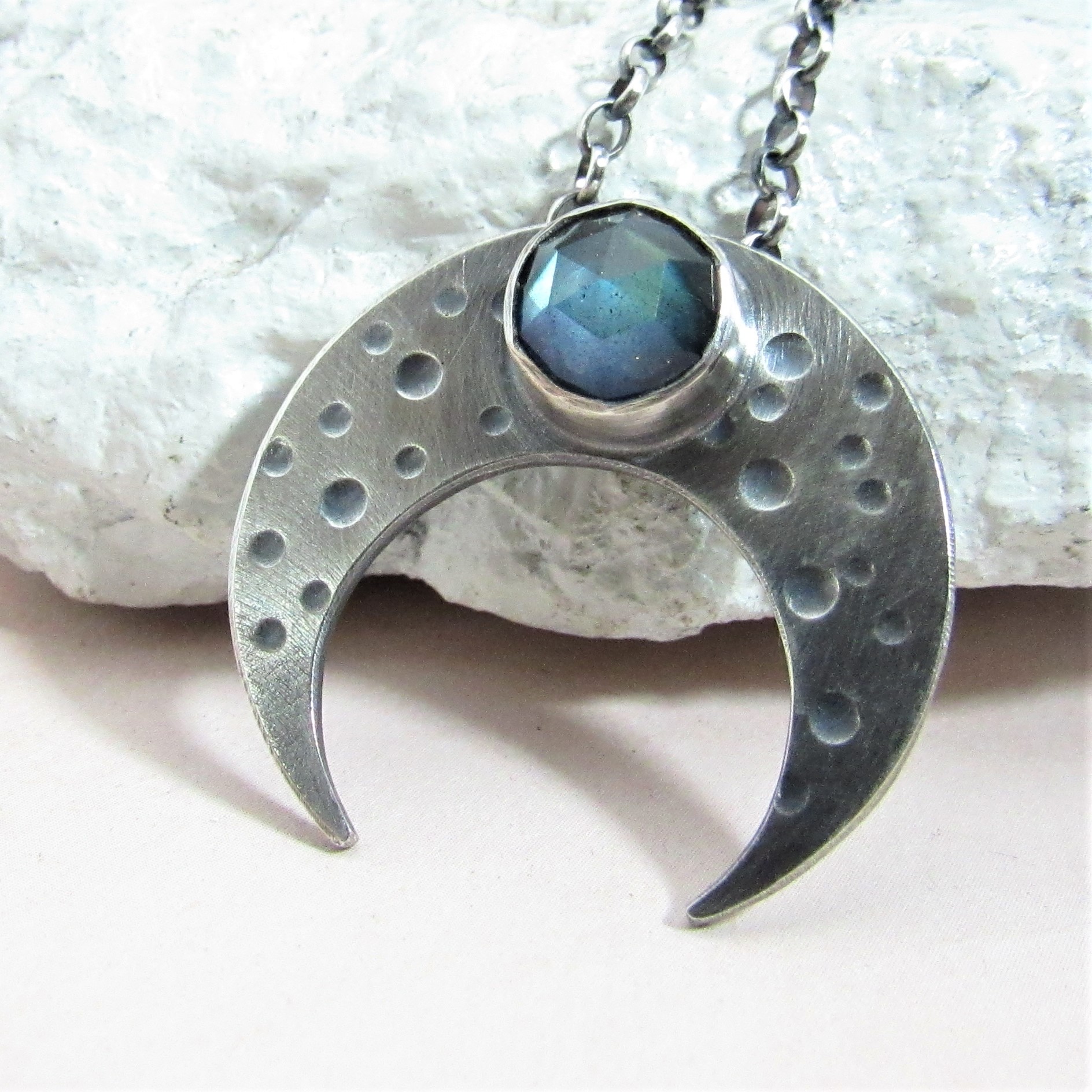 Upside down sterling crescent moon pendant with faceted labradorite