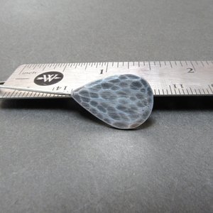 SS hammered teardrop earrings displayed against ruler to show size, apx. 1.5" long