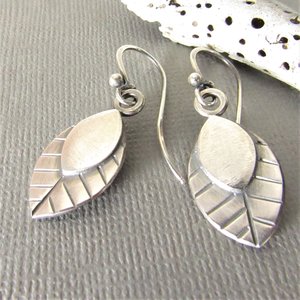 Lively little leaf earrings, made from superior argentium silver,  two layers, two different textures for depth,  swingy movement, oxidized polished finish. A great size for all day comfort, gift for your favorite nature enthusiast. 1.5 inch long