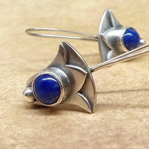 Handcrafted silver lotus earrings with blue lapis cabochon