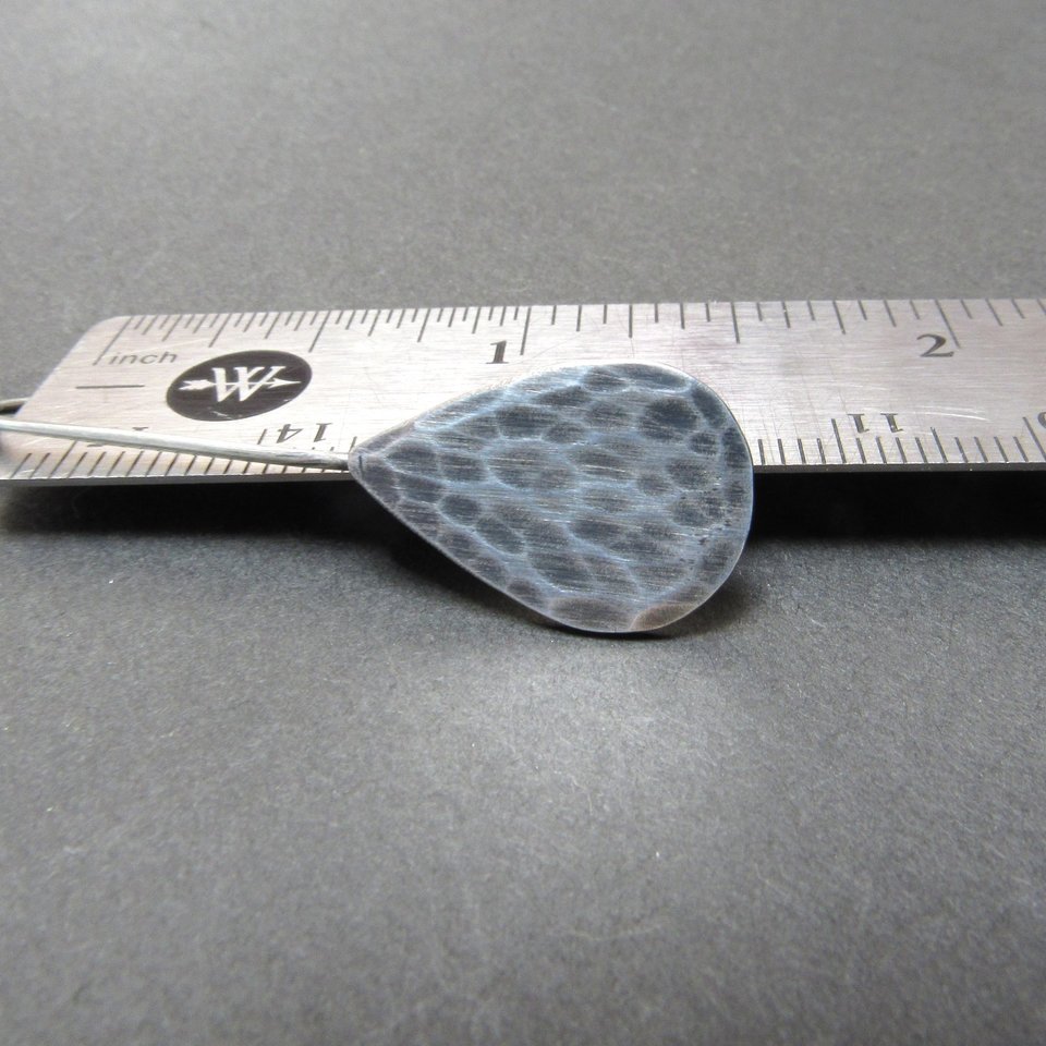 SS hammered teardrop earrings displayed against ruler to show size, apx. 1.5" long