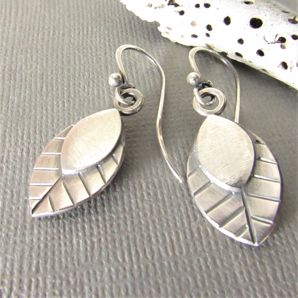 Lively little leaf earrings, made from superior argentium silver,  two layers, two different textures for depth,  swingy movement, oxidized polished finish. A great size for all day comfort, gift for your favorite nature enthusiast. 1.5 inch long