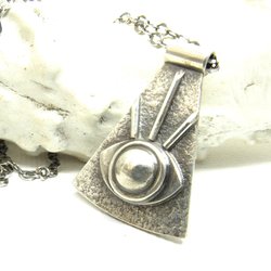 Eye of providence necklace in argentium sterling silver with 18" chain. Displayed on white background with antler.