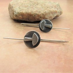 Petite whimsical little mushroom earrings in Argentium sterling silver. The silver is oxidized to provide contrast. Lightweight and small, perfect for work environments or a casual weekend. 1 and 1/8 inch long   x 5/8 wide. Ear wire extends 1/2 inch
